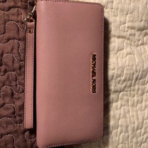 Light pink Michael kits wallet.